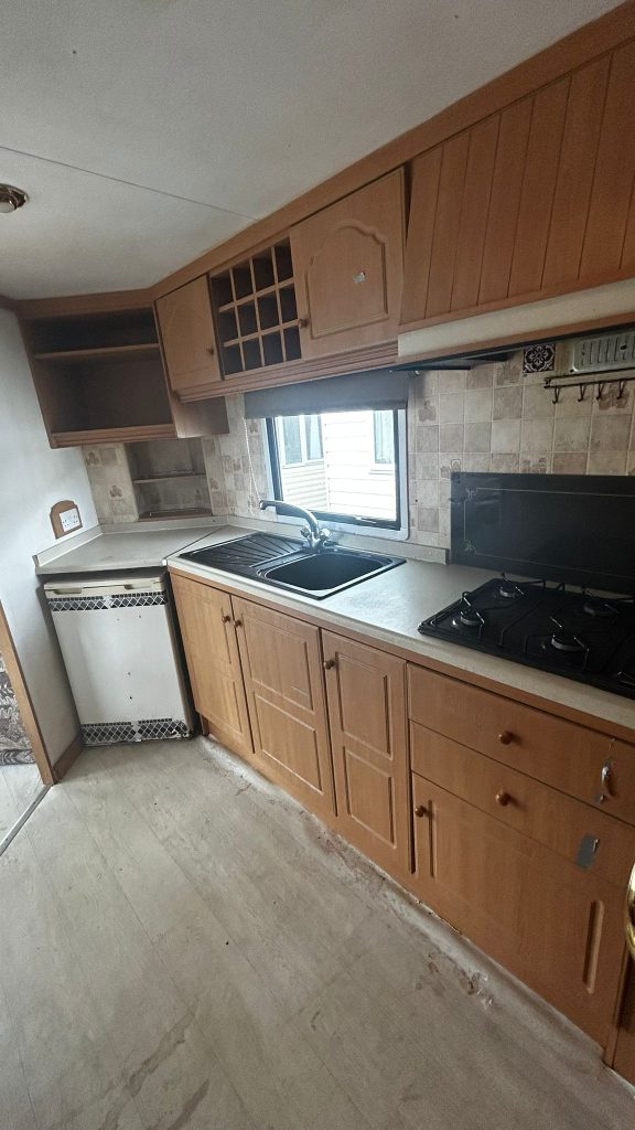 Sink and hob in a static caravan kitchen.