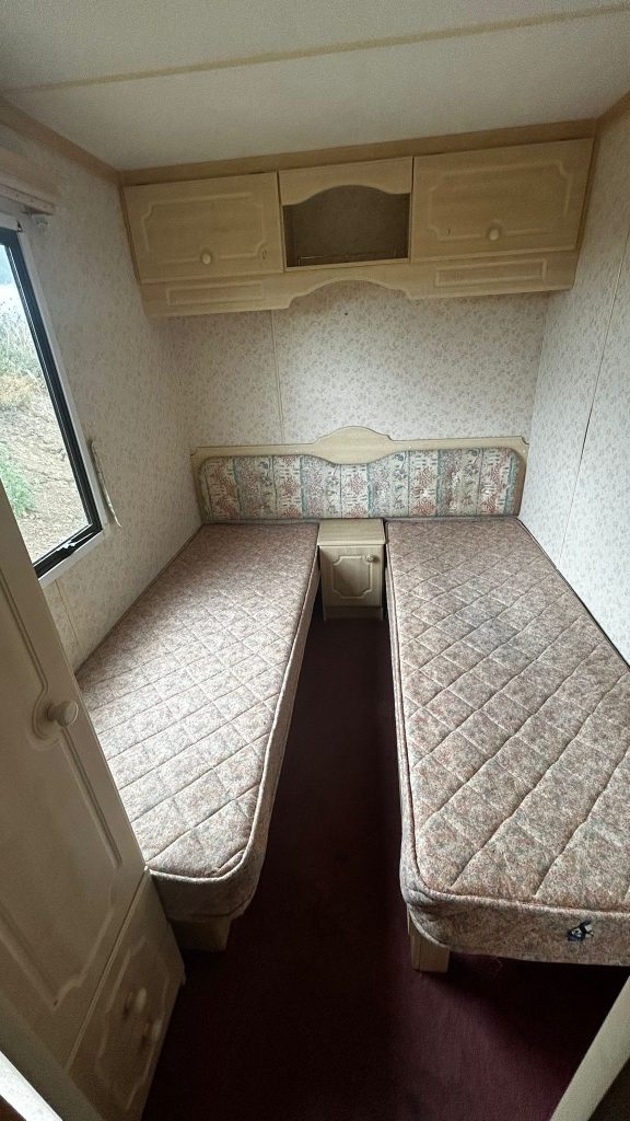 Two single beds in room